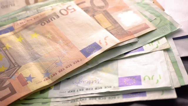 Euro Money Banknotes. Euro banknotes as part of the united country's payment system . Euro Money  currency. Cash money on the table. The euro is rising.  Concept of Forex or global financial economic.