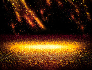 Abstract gold background with floating glitter dust