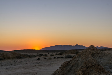 Fototapeta na wymiar rugged desert mountain landscape sunset
