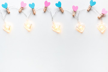 heart-shaped garland on a white background with space for text