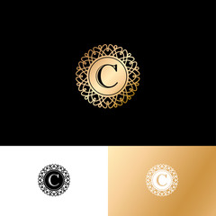 C letter or monogram. The original gold C letter symbol in an circle with lace ornament. Classic style.