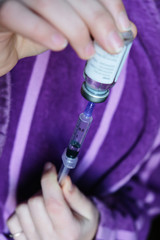 Medical hand dispose medication drug needle syringe drug, selective focus