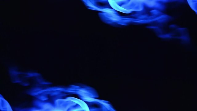 abstract blue smoke waving on the adges at dark background