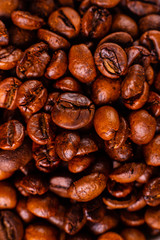 Seeds of fragrant coffee, coffee drink on a dark concrete background. It can be used as a background