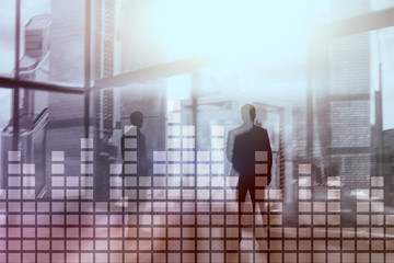 Fototapeta premium Financial chart on blurred skyscraper office background.