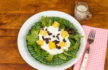 Cottage Cheese Salad with Pineapple and Raisins with serving of Poppy Seed Dressing