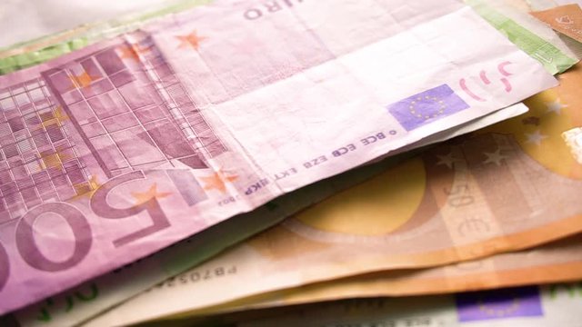 Counting money.  Receive payment concept. Euro banknotes. paying with cash concept. Euro bills in the man's hand.  European money. Euro banknotes in salary envelope. Money currency monetary