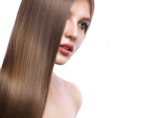Obraz premium Beautiful brown-haired girl with a perfectly smooth hair, and classic make-up. Beauty face.