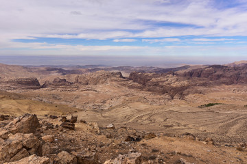 Fototapeta na wymiar Rocky wild desert landscape near Petra site in Jordan, 2018.