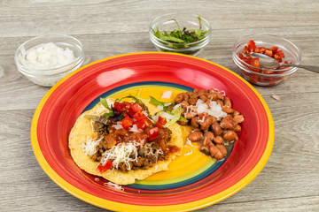 Mexican Dinner with Chalupas on Tostados and Barrocho Beans and Ingredients