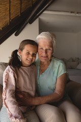 Grandmother and granddaughter relaxing together
