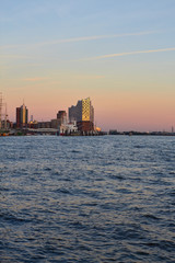 Fototapeta premium City streets of Germany. Panoramic view of the city of Hamburg from a height. Photo of Hamburg from a height. Cityscape houses and streets.