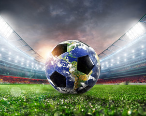 Soccer ball a as world. Earth provided by NASA.