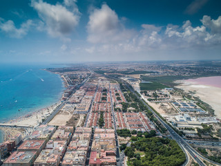 Aerial photo of harbour, residential houses, highways and Mediterranean Sea of Torrevieja. High angle view famous popular travel destinations for travellers. Costa Blanca. Alicante province. Spain 8