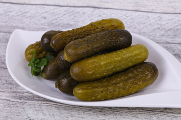 Pickled cucumbers heap in the bowl