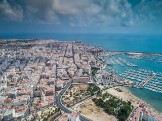 Aerial photo of harbour, residential houses, highways and Mediterranean Sea of Torrevieja. High angle view famous popular travel destinations for travellers. Costa Blanca. Alicante province. Spain 4