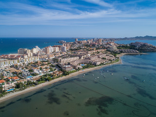 Aerial photo of tall buildings and the beach on a natural spit of La Manga between the Mediterranean and the Mar Menor, Cartagena, Costa Blanca, Spain 8