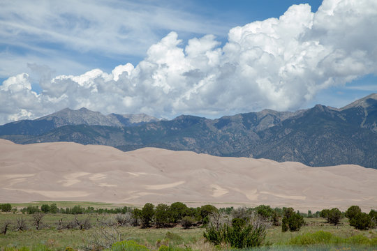 Clouds and sand dunes