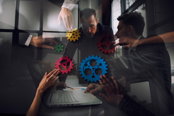 Business team connect pieces of gears. Teamwork, partnership and integration concept. Double...