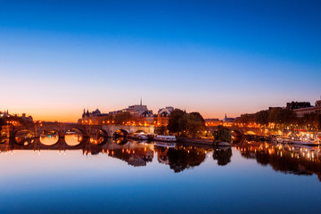 Fototapeta na wymiar Morning sunlight over the Seine river in Paris, France
