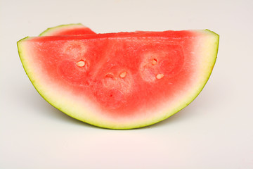Watermelon isolated on white. Sliced fresh melon peices