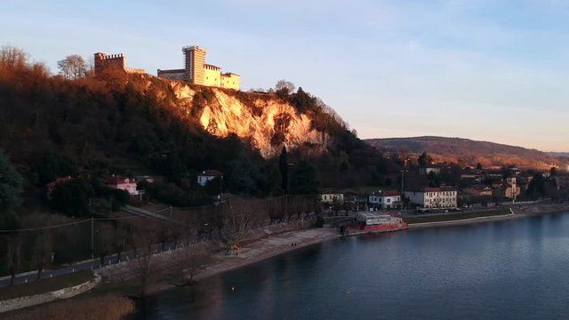 An aerial shot of Rocca di Angera castle over watching a town in northern Italy.