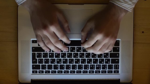 man working on laptop