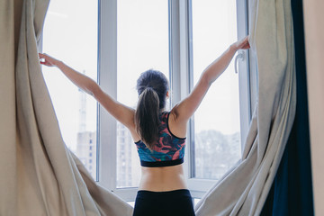 The young girl regularly sports. Morning exercise