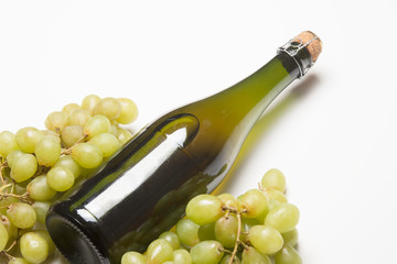 Wine bottle and delicious grapes for enjoyment and leisure bottle and delicious grapes for enjoyment and leisure