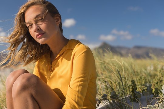 Fototapeta Young woman relaxing on the beach