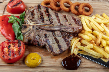 Gourmet Grill Restaurant Steak Menu - T-Bone Beef Steak on Wooden Background. Black Angus Prime...