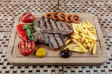 Gourmet Grill Restaurant Steak Menu - T-Bone Beef Steak on Wooden Background. Black Angus Prime...