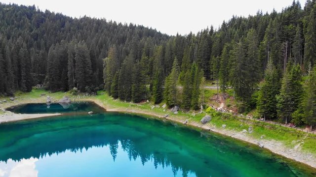 Drone aerial Carezza lake Italy nature landscape touristic view