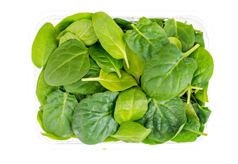 Spinach fresh green leaves in transparent package