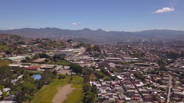 Aerial footage of city centre in Tegucigalpa Honduras. Flying forward and upwards using a drone.