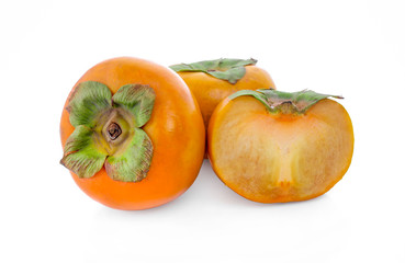 fresh ripe persimmons isolated on white background