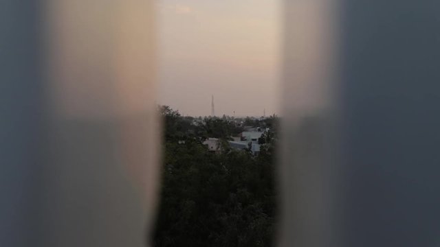 A static shot of a tower placed at center with walls on side.