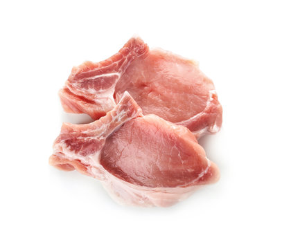 Raw steaks on white background, top view. Fresh meat