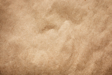 Brown paper bag texture as background, top view