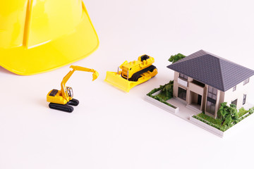 住宅工事 イメージ ヘルメット家 工事現場