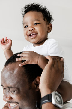 Cheerful Dad And His Baby