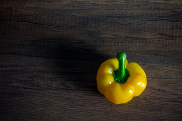 Bell pepper or sweet pepper on wooden table