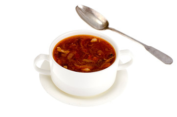 White bowl with vegetable soup isolated on white background