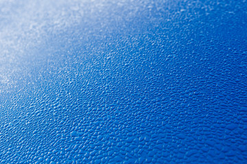 Water drops on blue background