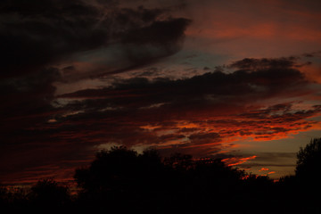 Fototapeta na wymiar Painted The Dense Clouds Sunset