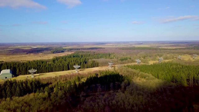Drone Shot of The Westerbork Synthesis Radio Telescope (WSRT). An aperture synthesis interferometer consisting of a linear array of 14 antennas