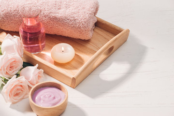 Spa and aromatherapy. Rose flower and essential oil.