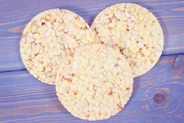 Rice or corn diet bread for breakfast, healthy nutrition concept. Vintage photo