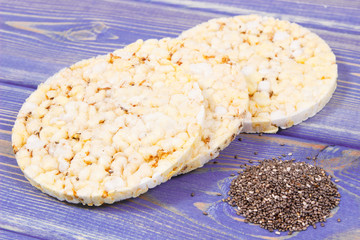 Crunchy rice or corn waffles with chia seeds and spices, healthy dietary breakfast concept