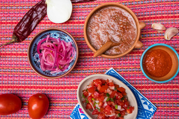 Table Top Spread of Traditional Salsas and Condiments in Mexico 
